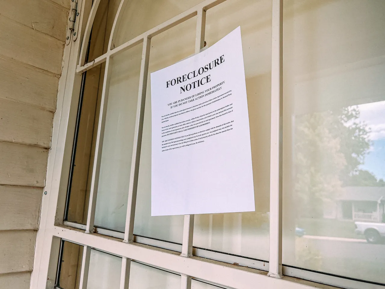 Legal notice posted on front door