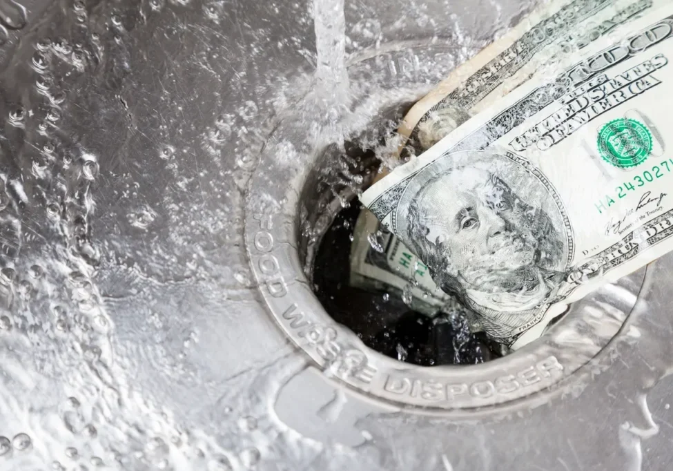Cash being washed away in sink